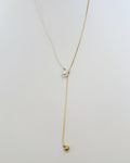 Collar corbatero con perlas