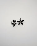 Huggies de flor negra