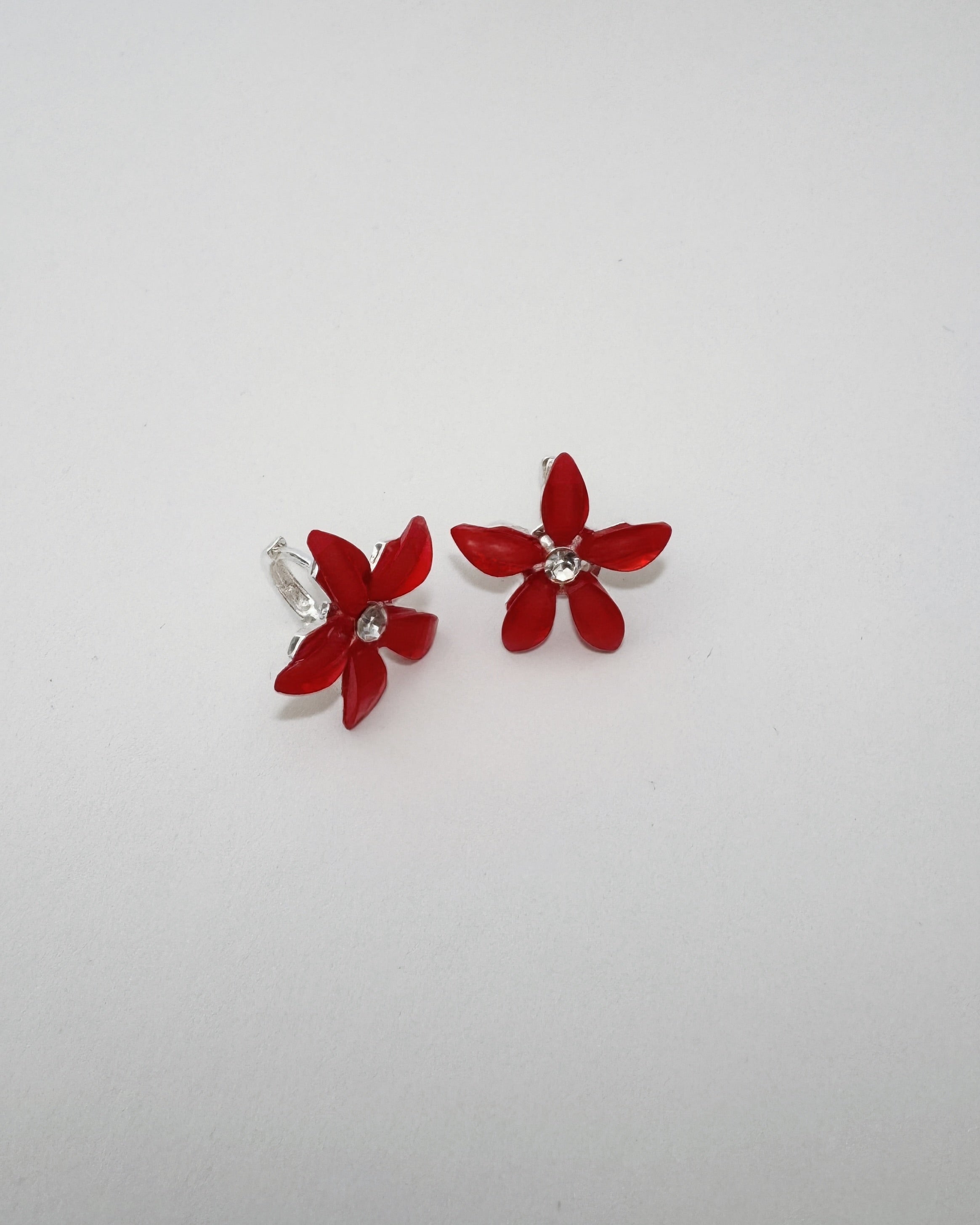 Huggies de flor roja