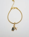 Pulsera con charms de viaje