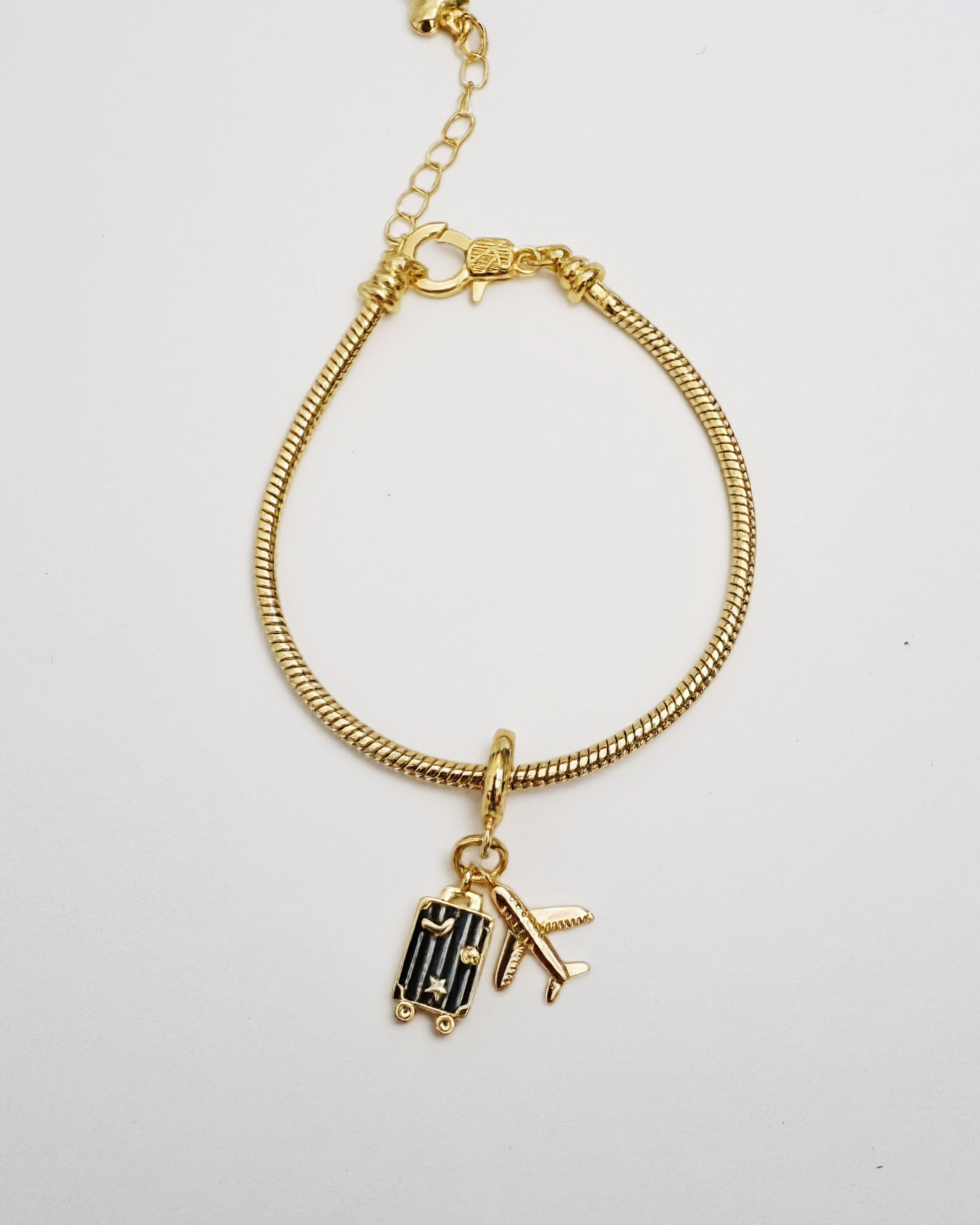 Pulsera con charms de viaje